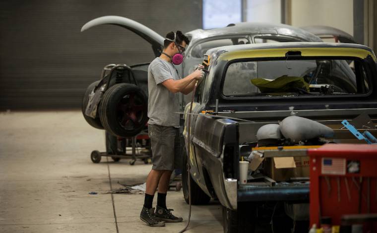 Image of a mechanic working on a car