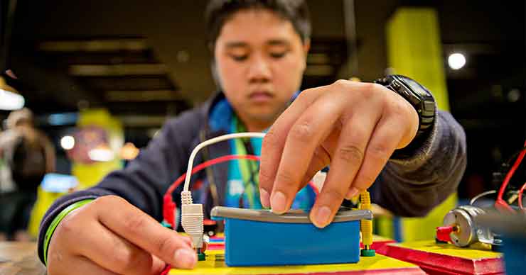 A student working on an electrical system