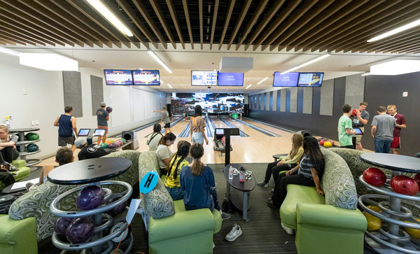 Family bowling at UVU's bowling alley