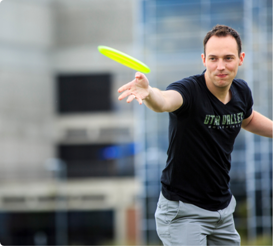 Person throwing a frisbee