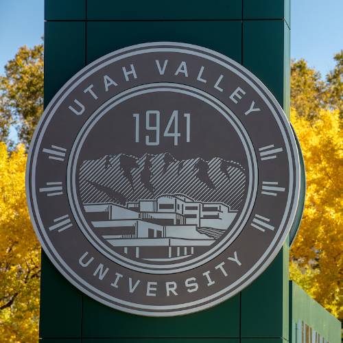 UVU Sign with Fall leaves