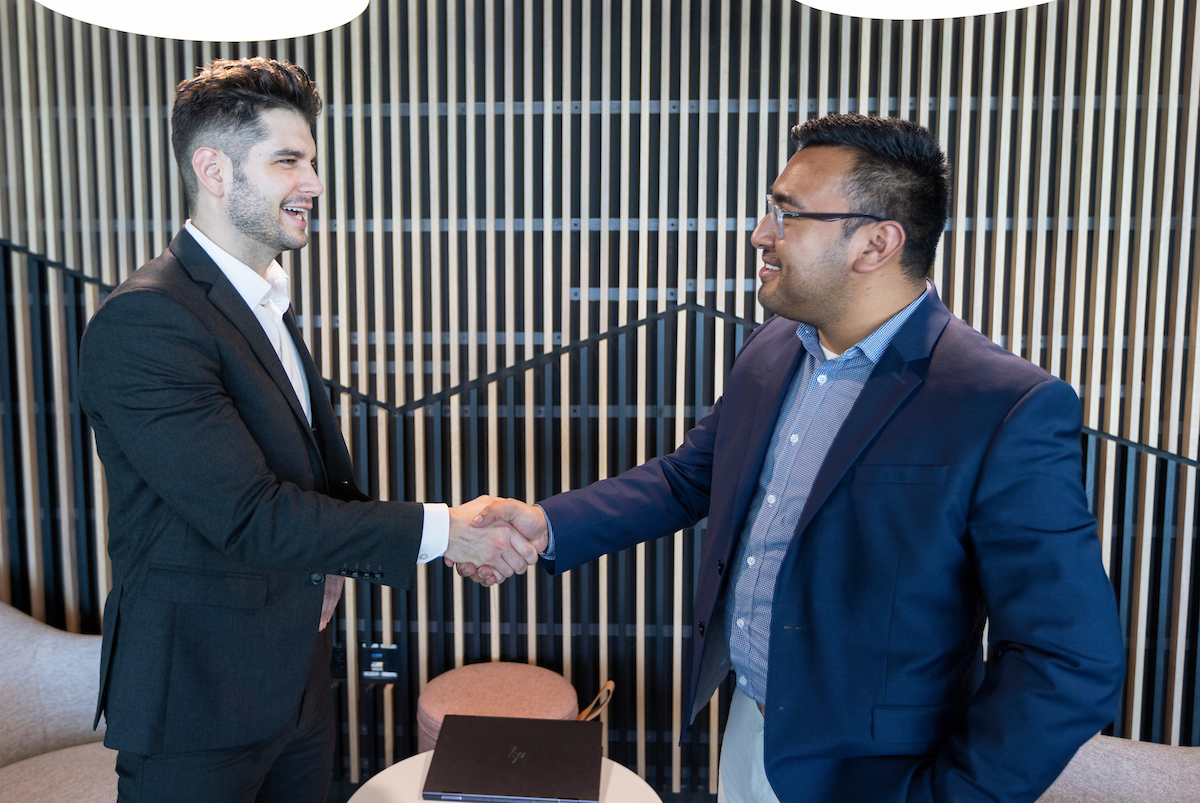 two business people shaking hands