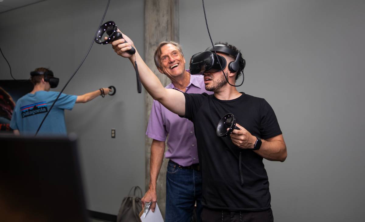 A student wearing VR gear