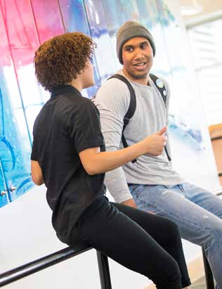 two students talking to each other