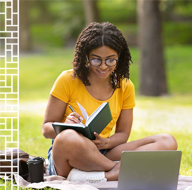 student studying outside