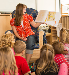 woman reading to children