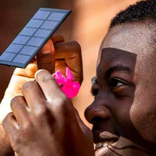 PREP student working with solar panel