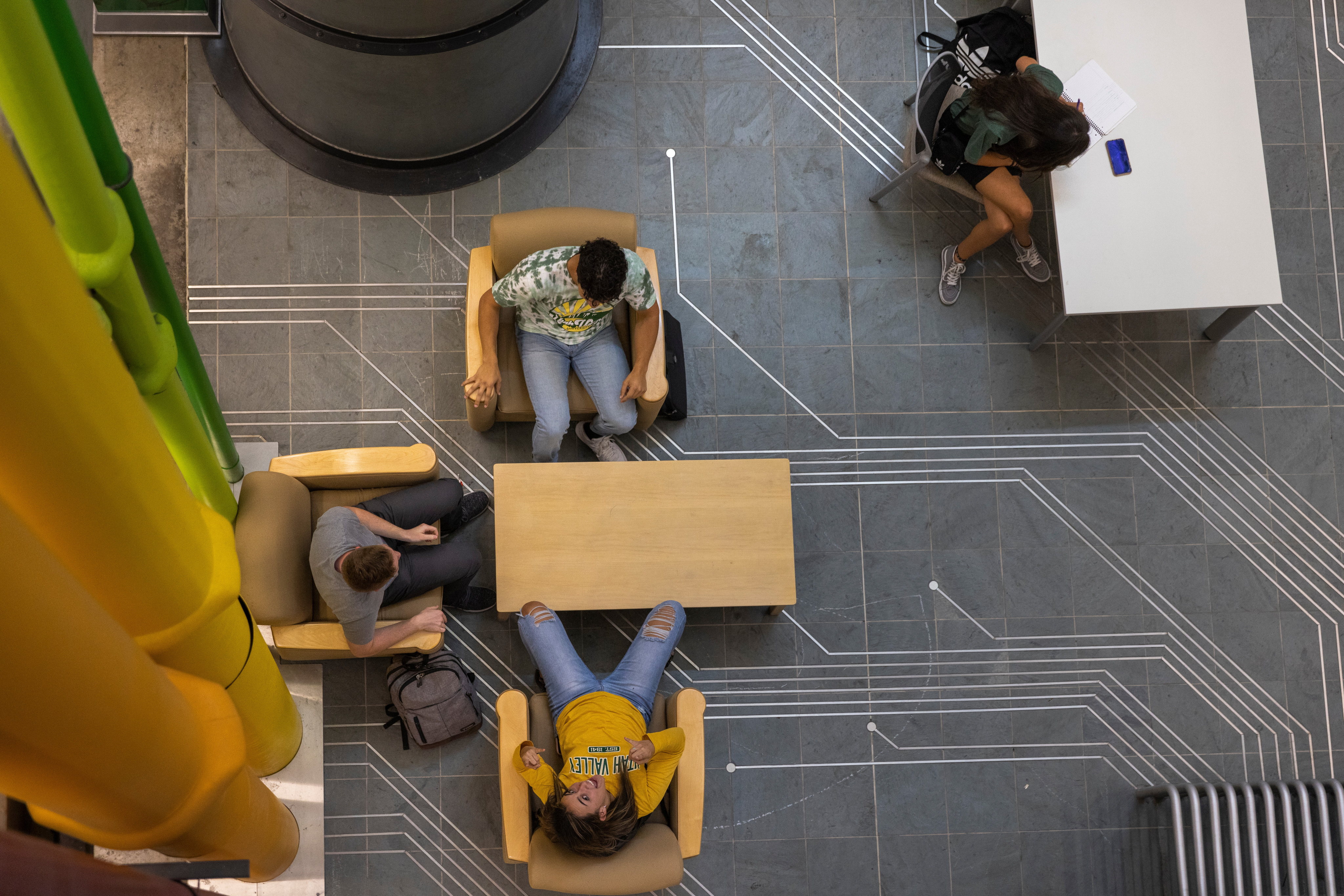 Overhead view of students sitting at a table