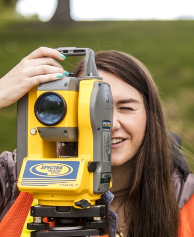 girl using a surveying device