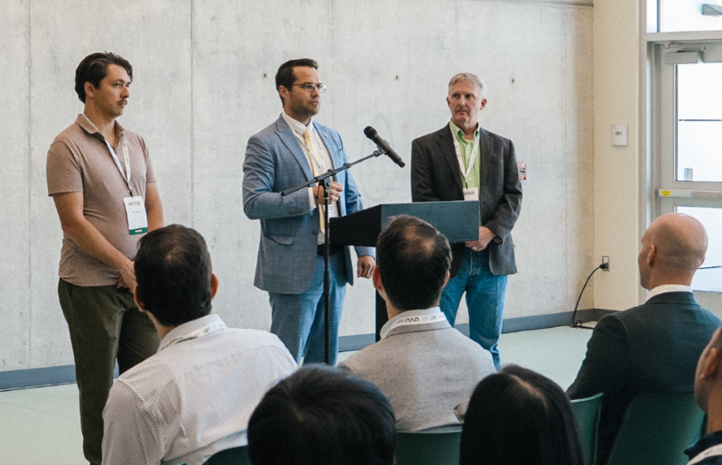 Christopher Bramwell, Utah's Chief Privacy Officer and Director of the Office of Data Privacy, on stage at the HITLAB x UVU World Cup Innovation Pitchday and Hackathon