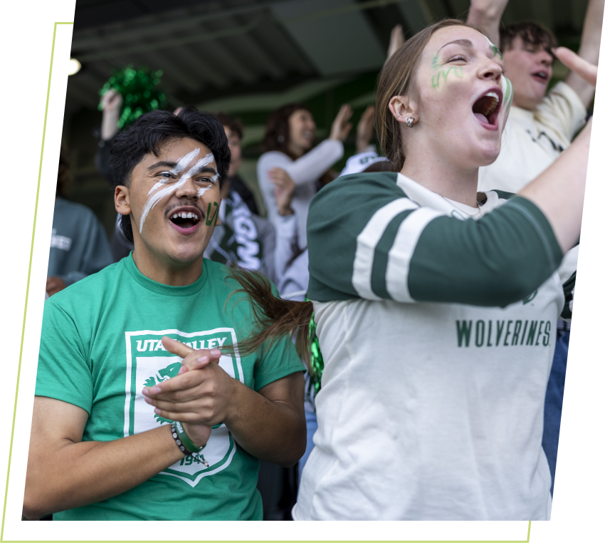 students cheering at UVU sport event