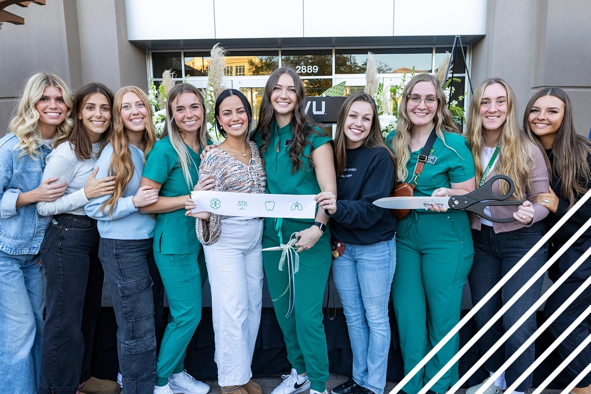 A group of dental hygiene students stands in front of the new UVU dental hygiene lab and community clinic to celebrate the building’s ribbon-cutting. A group of dental hygiene students stands in front of the new UVU dental hygiene lab and community clinic to celebrate the building’s ribbon-cutting.