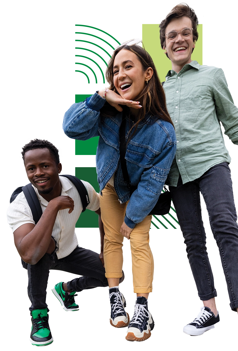 Three UVU students smile together as they pose for the camera. 