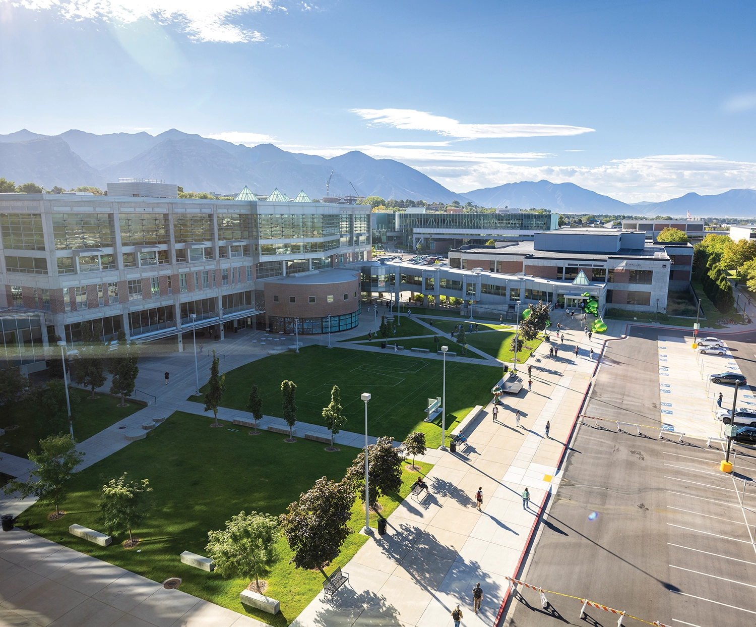 Aerial view of students walking near the UVU Fulton Library quad and the Liberal Arts Building. 