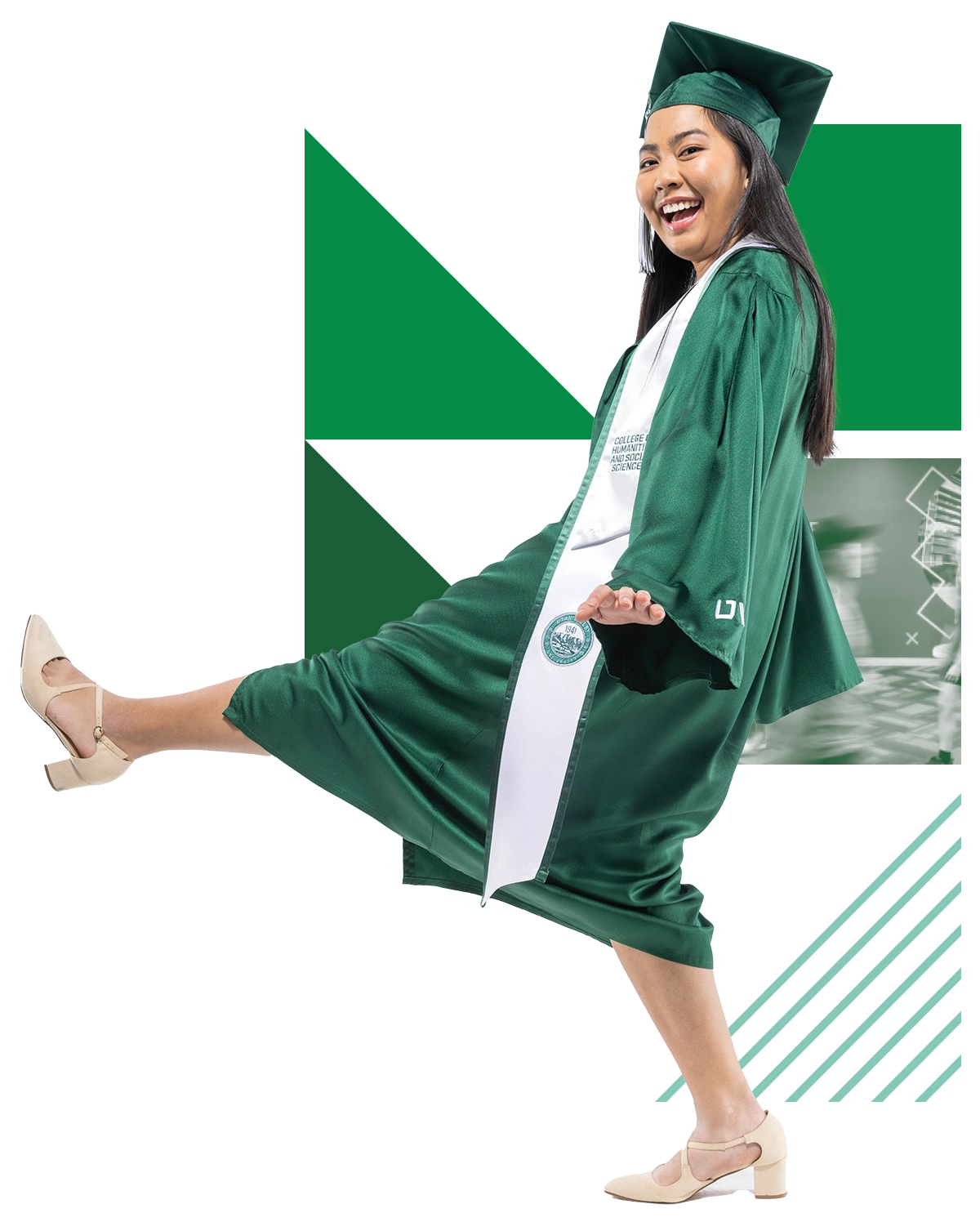 A student in green UVU regalia and a white UVU College of Humanities and Social Sciences stole smiles. A student in green UVU regalia and a white UVU College of Humanities and Social Sciences stole smiles.