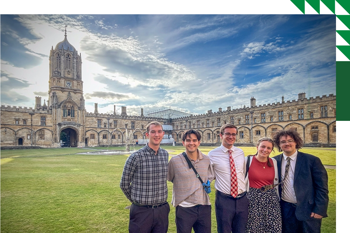 Five UVU students pose together in front of a fountain and lawn at the University of Oxford in England. Five UVU students pose together in front of a fountain and lawn at the University of Oxford in England.