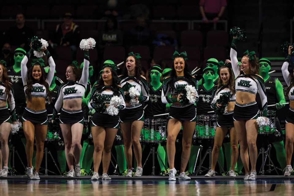 Group shot of the UVU Spirit Squad, which includes the cheer team and the Green Man Group. 