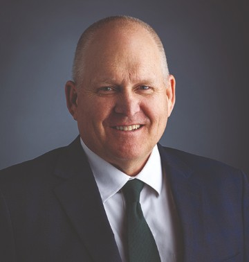 Headshot of Robert D. Allen, dean of UVU’s Woodbury School of Business. 
