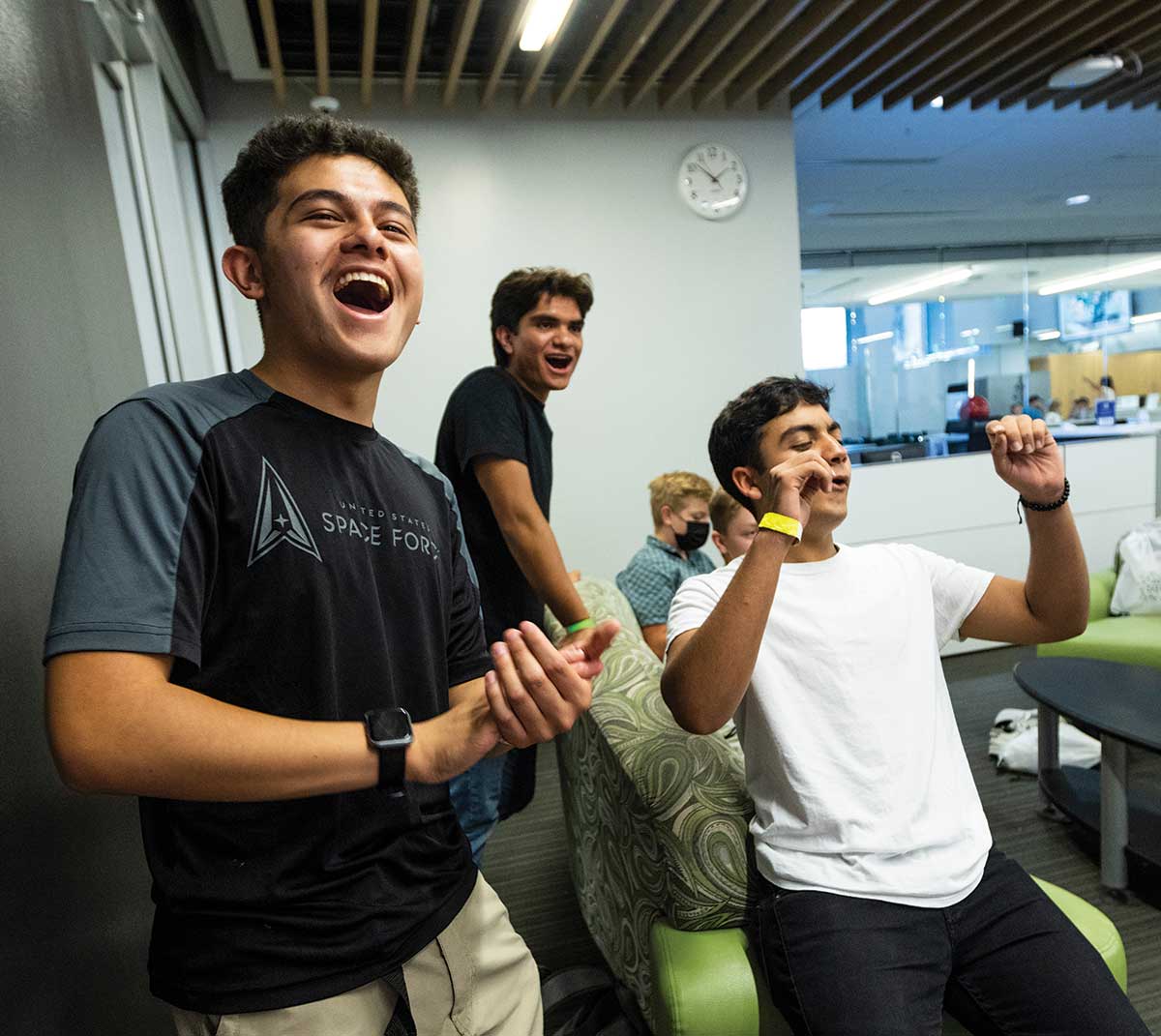 Latinos of Tomorrow Summer Bridge Program participants cheer while playing a game on UVU’s Orem Campus. 