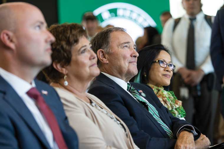 Utah Governor Spencer Cox, Former First Lady of Utah Jeannette Herbert, Former Utah Governor Gary Herbert, and President Astrid S. Tuminez sit together as they listen to a speech during the opening of the Gary R. Herbert Institute for Public Policy. 