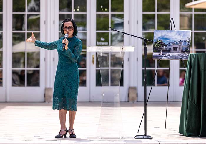 President Astrid S. Tuminez speaks outdoors during the opening of the new UVU Museum of Art at Lakemount.