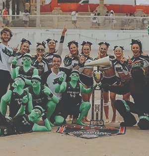 A photo of the UVU Spirit Squad with a trophy they won at the 2023 NCA&NDA Collegiate Cheer and Dance Championship. 