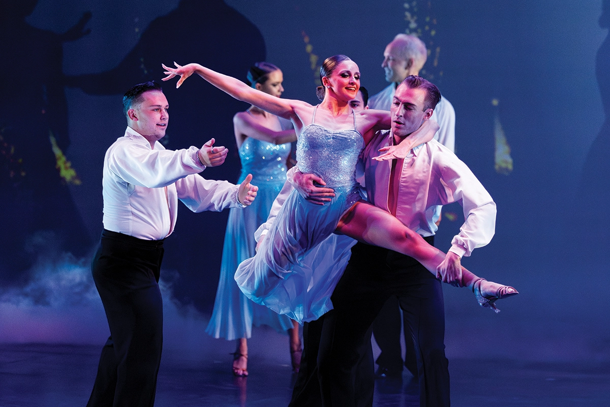 The UVU ballroom dance team performs on stage. The UVU ballroom dance team performs on stage.