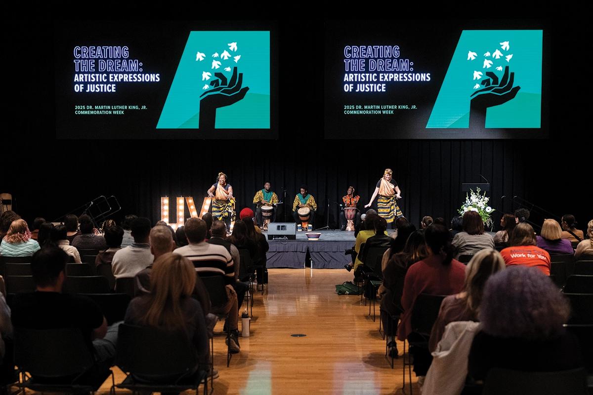 Performers dance on stage and play drums in front of an audience during UVU’s Martin Luther King Jr. Commemoration Week. Performers dance on stage and play drums in front of an audience during UVU’s Martin Luther King Jr. Commemoration Week.