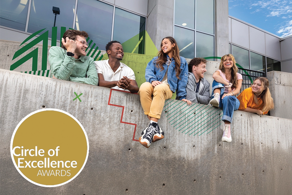 A UVU campus advertisement featuring six UVU students on UVU campus, along with a logo of the Circle of Excellence Award the advertisement campaign won. 