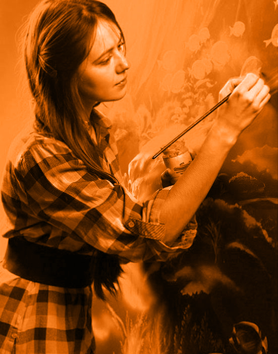 Girl painting on canvas