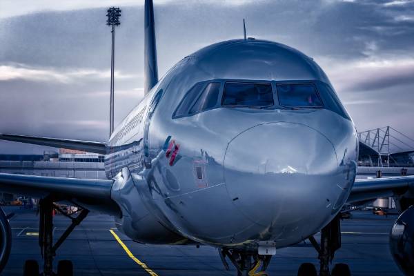 A picture of a plane from the front, looking down to the tail