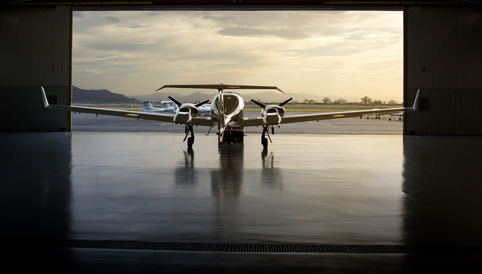 UVU plane sitting in a hanger