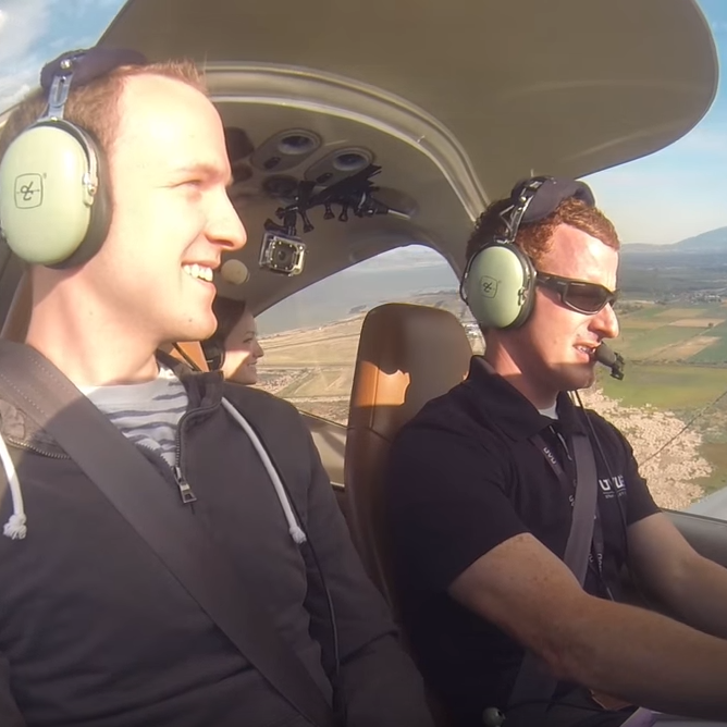 two men in a cockpit