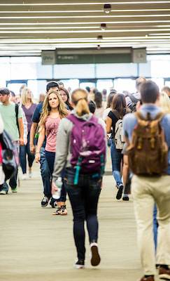 Students walking around inside UVU campus