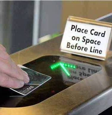 person scanning their card