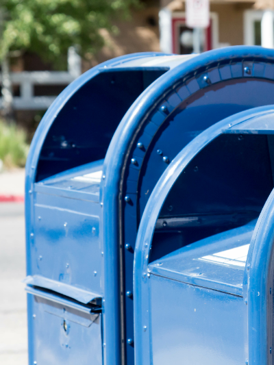 two blue mailboxes