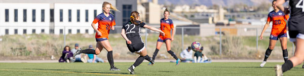 Women playing intramural soccer at UVU