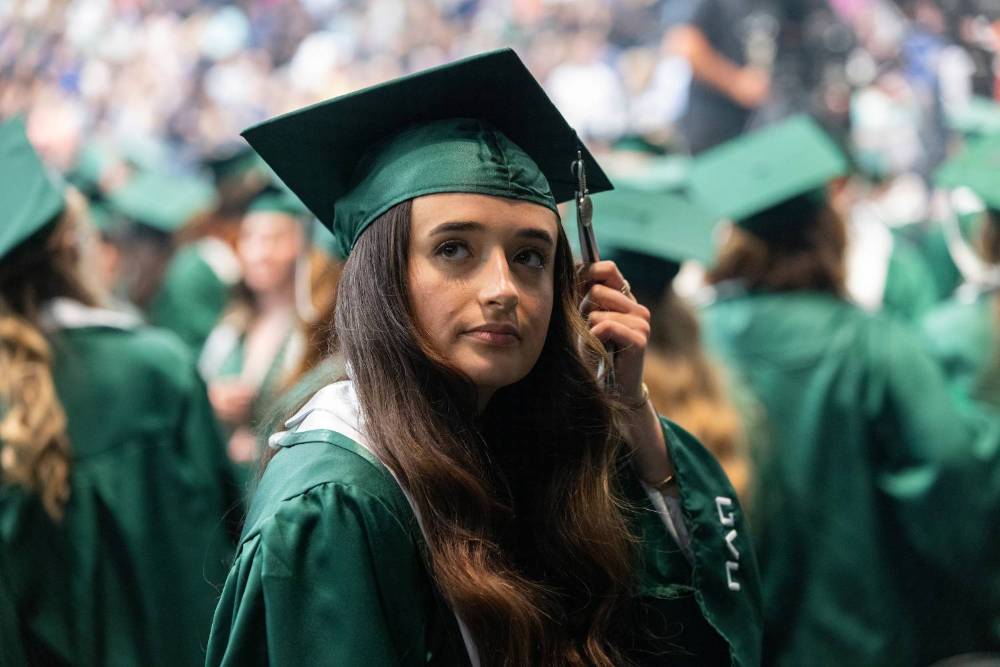 Image of a UVU graduate at commencement
