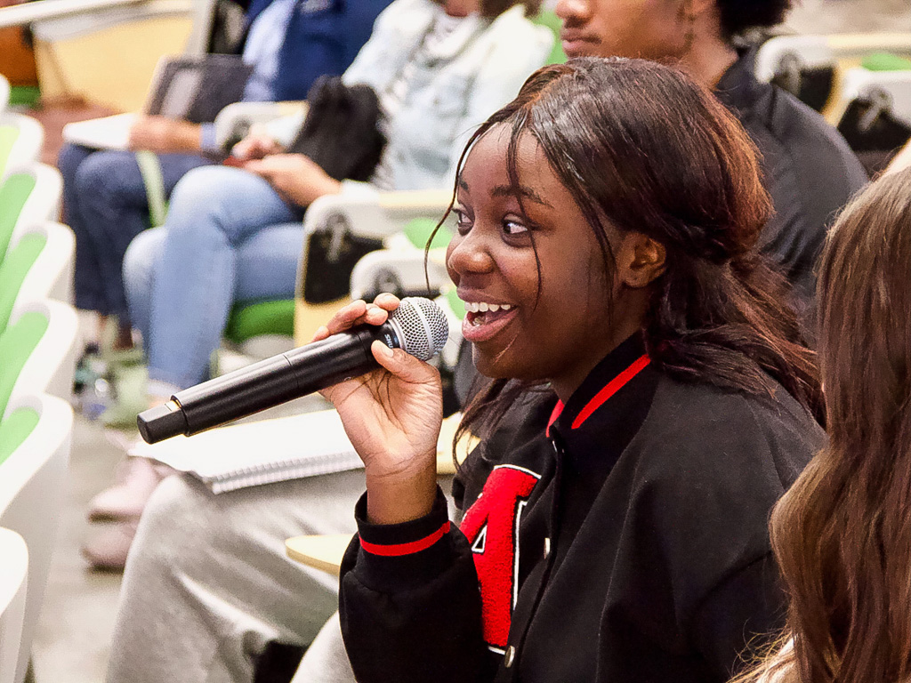 Image of a student holding the mic during Constitution Day 2022