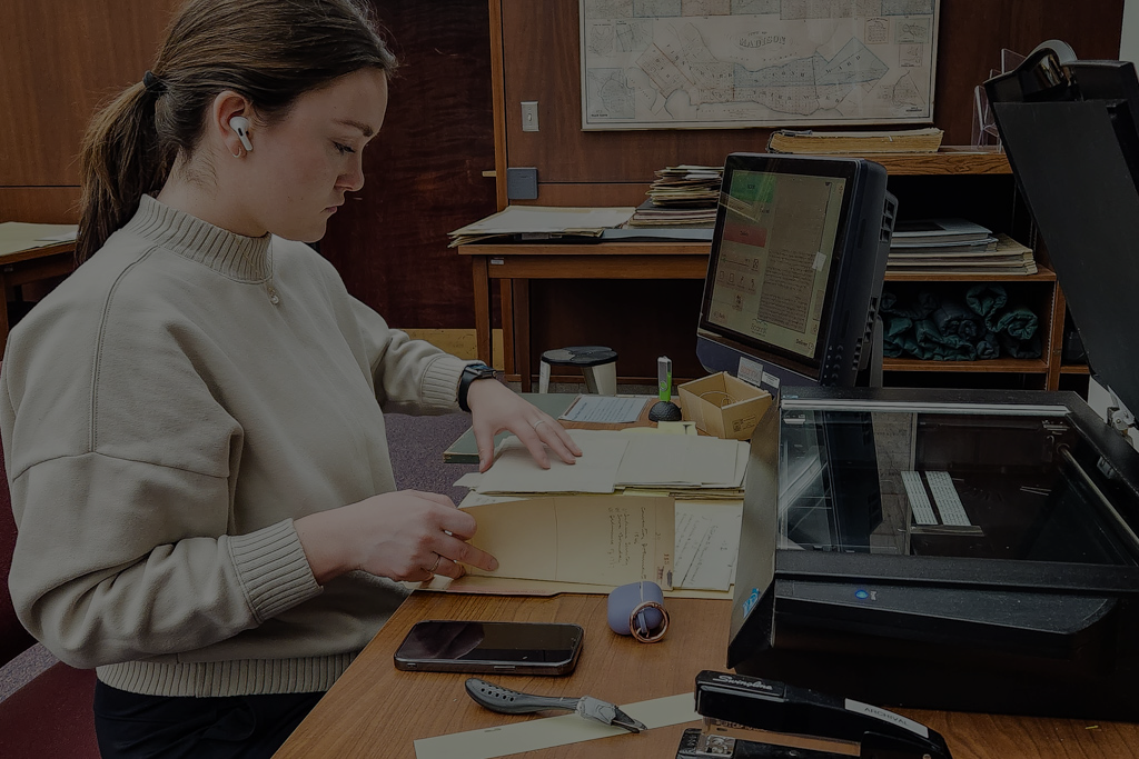 Photo of student working on documents