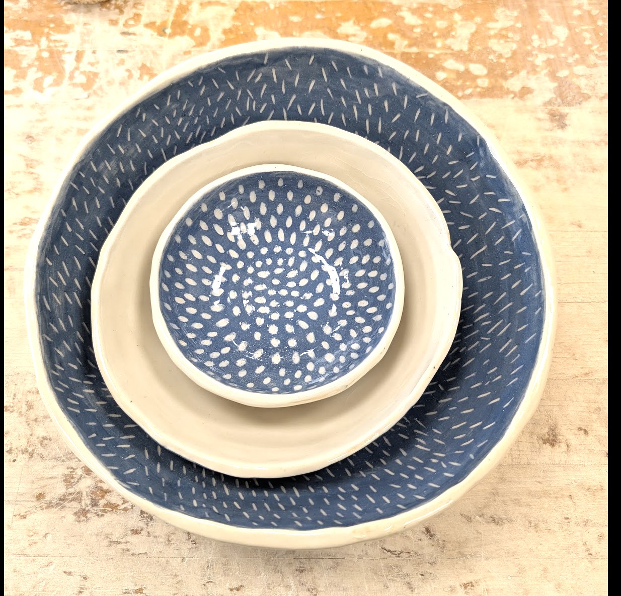 Three handmade ceramic bowls