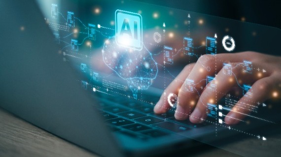 A person working on a computer with AI's Help