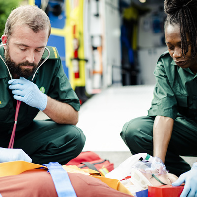 Paramedics working on a patient