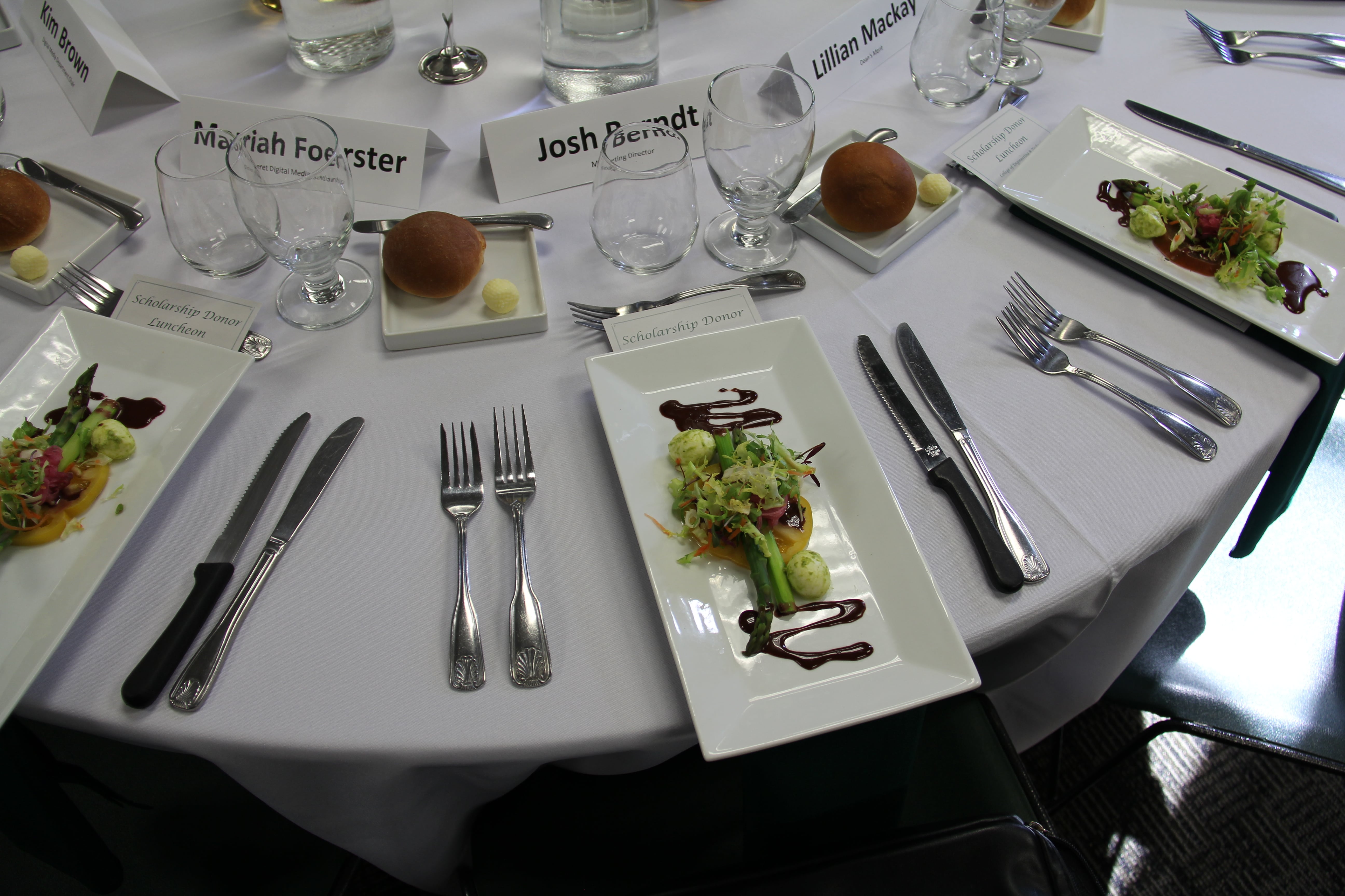a table set with food and silverware