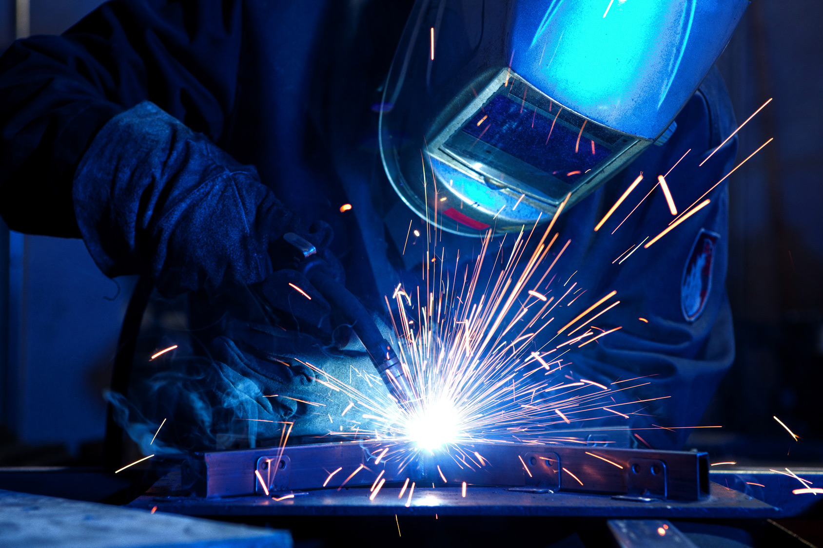 Person using welding tool