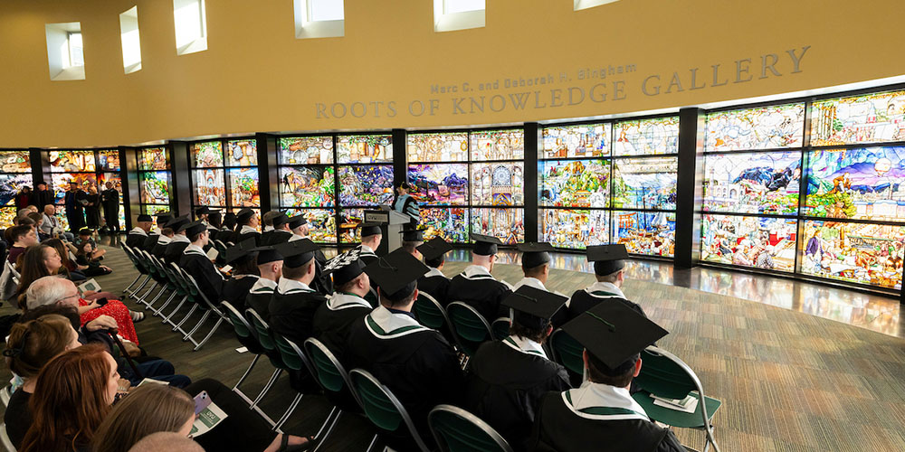 group of master's graduates in their regalia