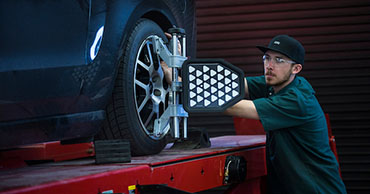 man working on a car
