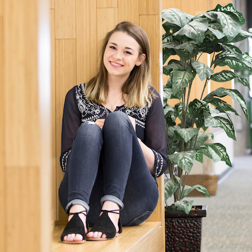 female student sitting in nook