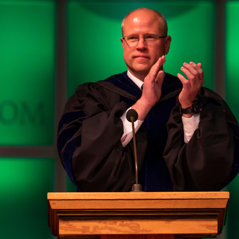 Dean Steven Clark Applauding at Graduation