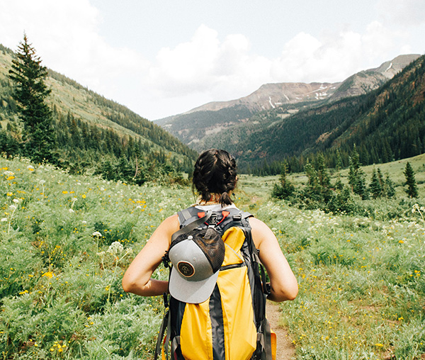 Hiker moving forward on her path